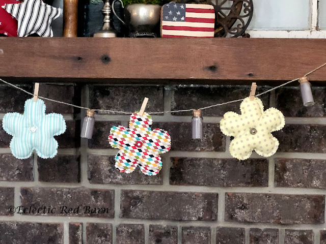 Garland of flowers. Share NOW. #garland, #flowers, #fabricflowers, #crafting, #eclecticredbarn